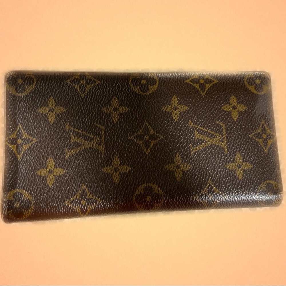 Louis Vuitton  Poche Toilette NM